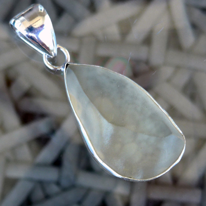 Curving Libyan Desert Glass Teardrop Pendant