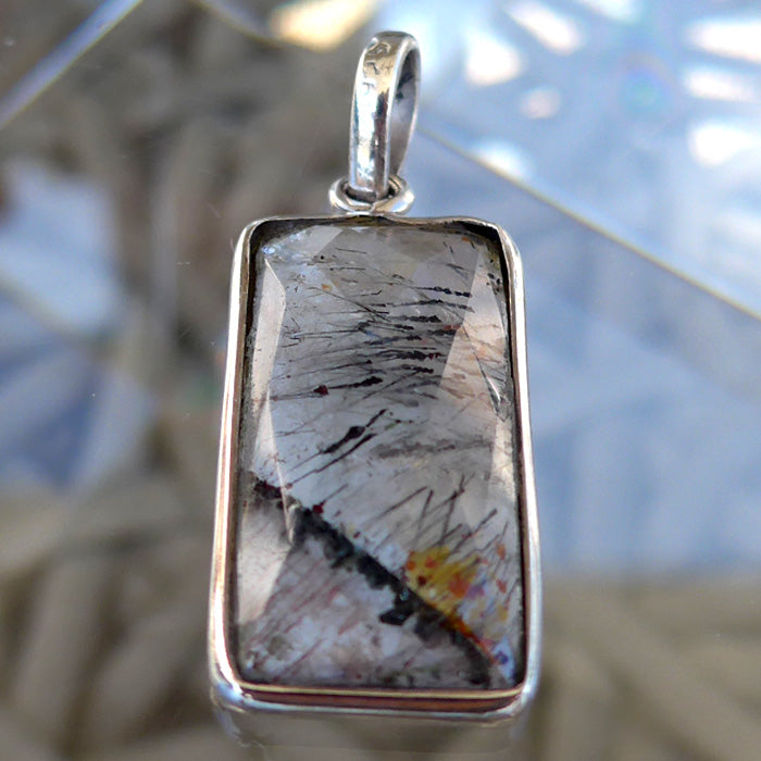 Faceted Espíritu Santo Rutilated Amethyst Pendant