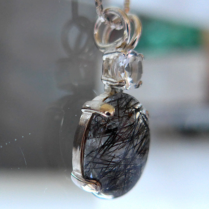 Tourmalinated Quartz Oval Pendant with White Topaz Crown