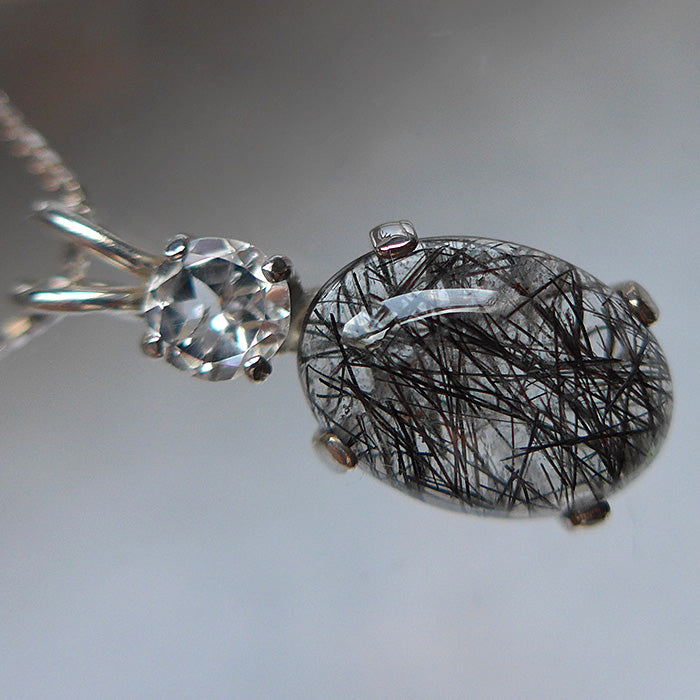 Tourmalinated Quartz Oval Pendant with White Topaz Crown