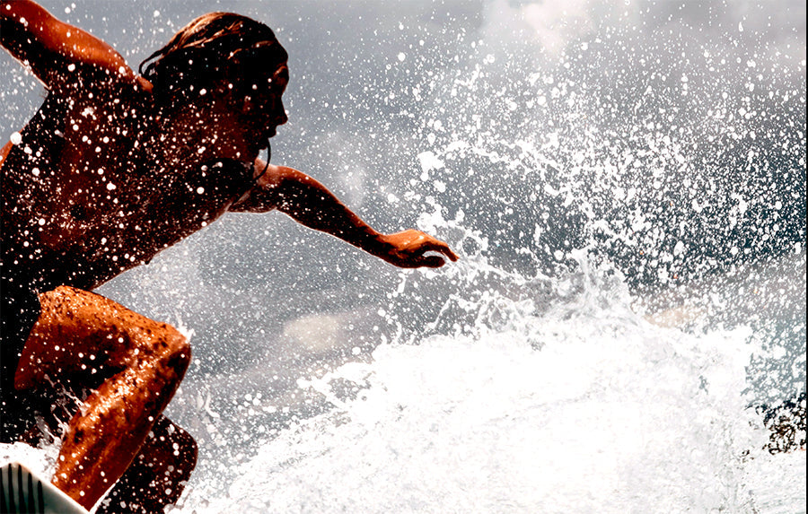 Surfing in Gerupuk, Indonesia Photo byOliver Sjöström on Unsplash