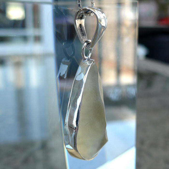 Curving Libyan Desert Glass Teardrop Pendant