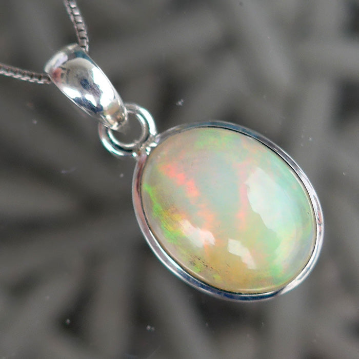 Flashy Oval Ethiopian Opal Pendant