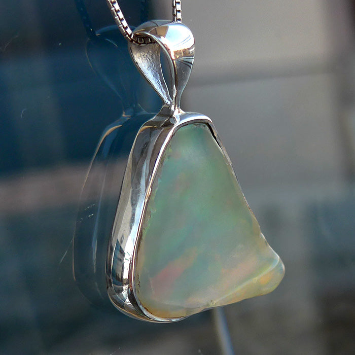 Multicolored Ethiopian Opal Triangular Pendant