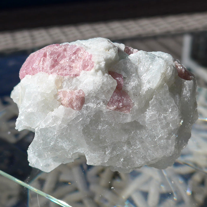 Pink Tourmaline Rods in Rough Tourmaline Matrix