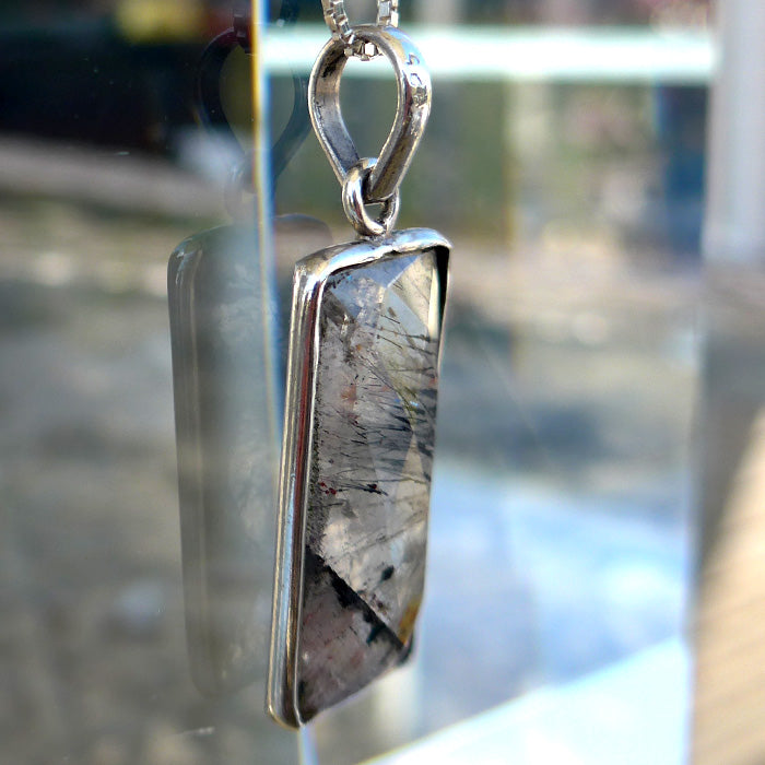 Faceted Espíritu Santo Rutilated Amethyst Pendant