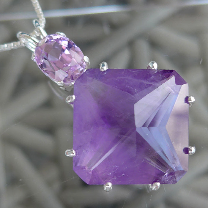 Amethyst Sparkling Large Magician Stone with Oval Kunzite Gemstone