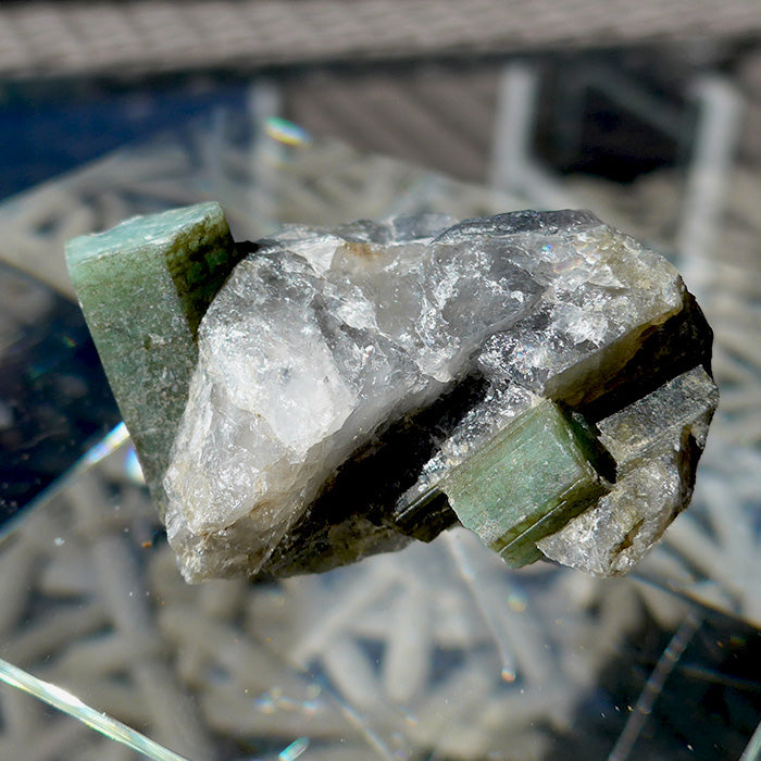 Emerald Rods in Heavy Metal and Quartz Matrix