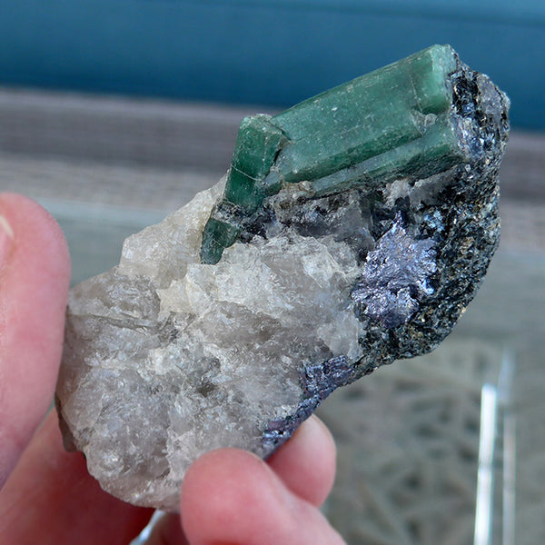 Emerald Rod on Matrix with Hematite