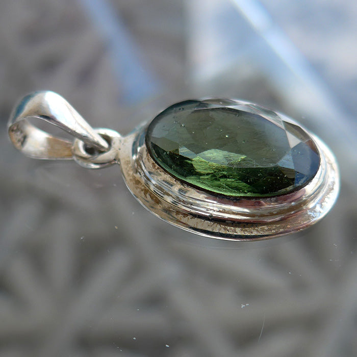 Polished Oval Faceted Moldavite Pendant