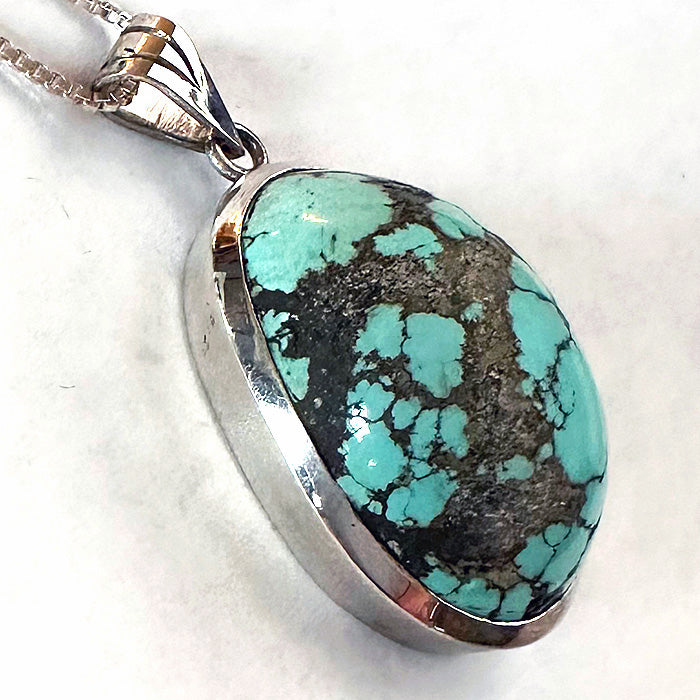 Persian Turquoise Oval Pendant in Sterling Silver