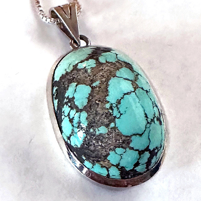 Persian Turquoise Oval Pendant in Sterling Silver