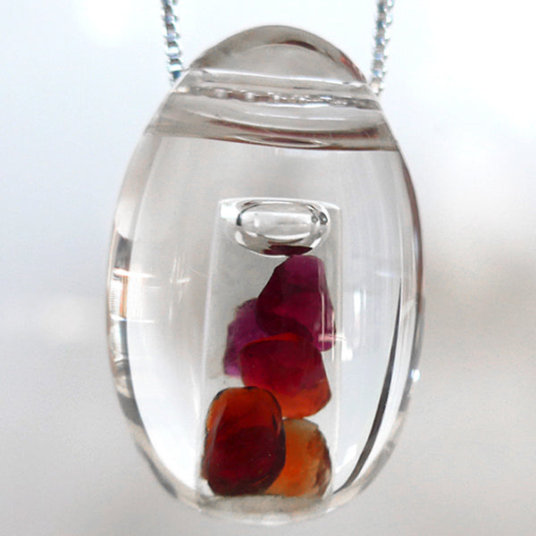 Navajo Garnet in Quartz Oval Water Drop Pendant by Brian Cook