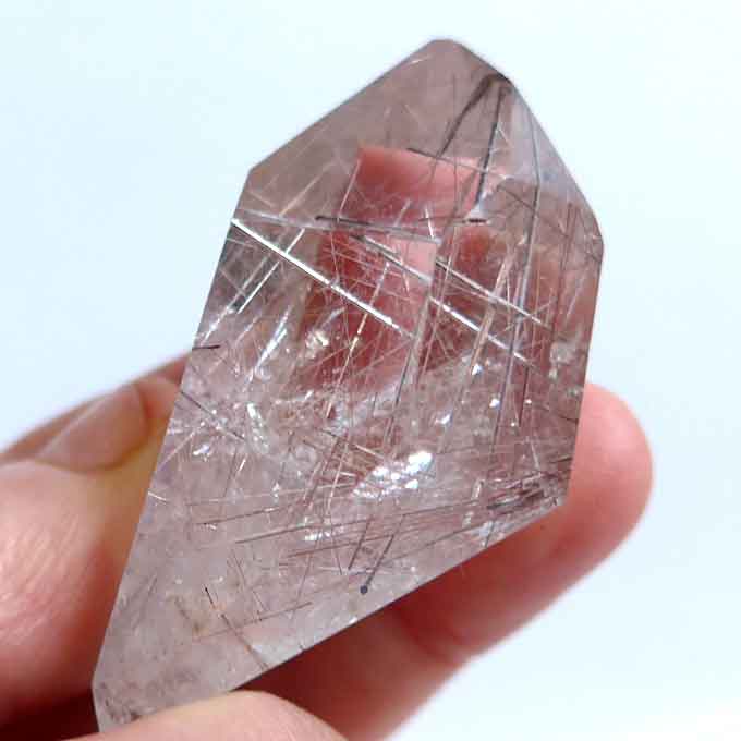 Polished Reclining Silver and Brass Rutile Point