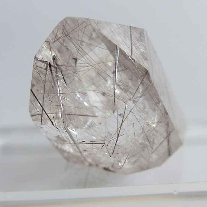 Polished Reclining Silver and Brass Rutile Point