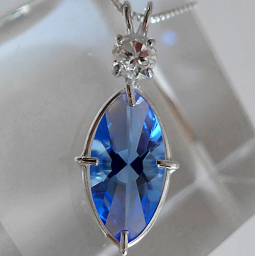 Siberian Blue Quartz Infinite Eye with White Topaz