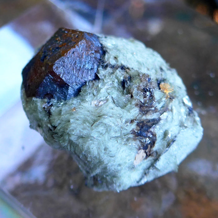 Spessartine Garnet in Mica Matrix